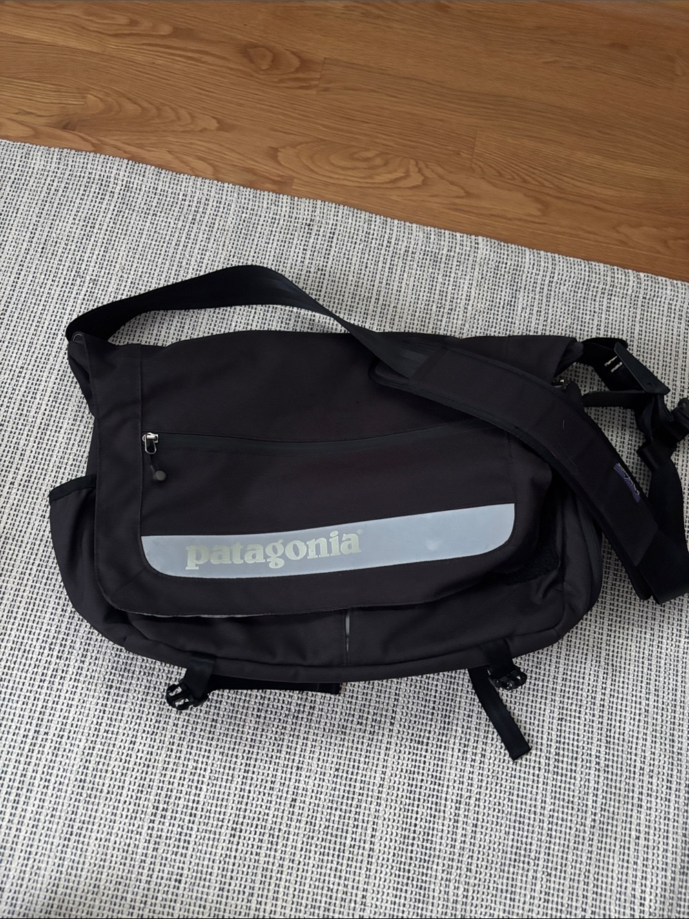Patagonia Black Messenger Bag with Reflective Gray Logo